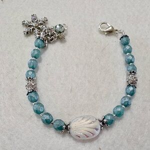 Snow Flurry Bracelet. Blue Czech glass bracelet with snowflake Charm